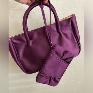 2 piece small retractable handles handbag and wristlet purple satin like